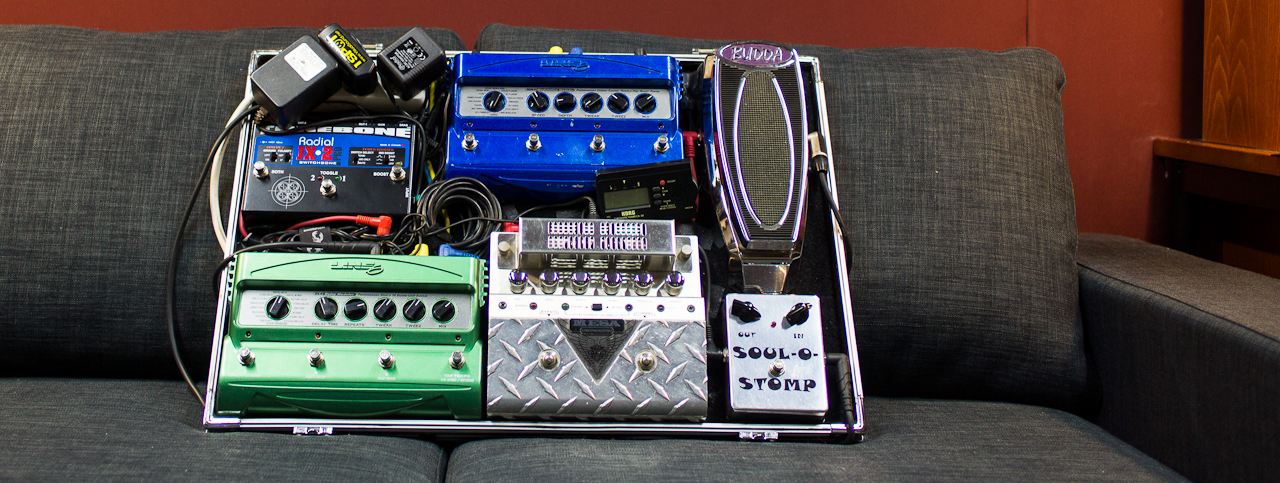 My other pedalboard featuring: Radial JX-2. Line6 MM4, Line6 DL4, Mesa V-Twin, Austin Electornics Soul-o-Stomp and Budda Wah (post-Peavey).