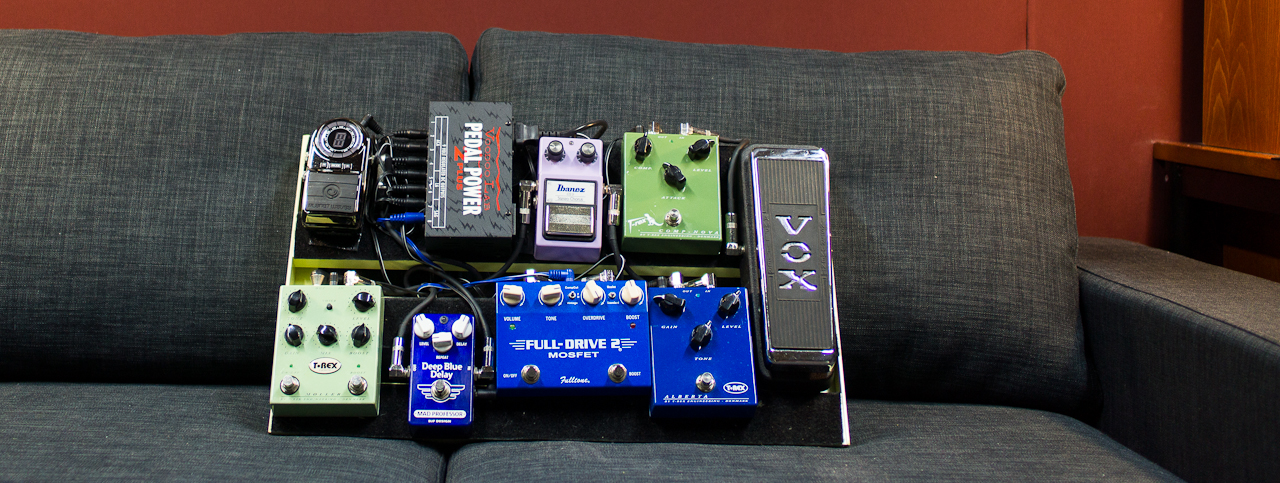 My other pedalboard featuring: Planet Waves tuner, Ibanez AD9, T-Rex CompNova, T-Rex Moller, Mad Professor Deep Blue Delay (hardwired), Fulltone Full-Drive2, T-Rex Alberta, and Vox V847 wah. Powered by Voodoo Labs.